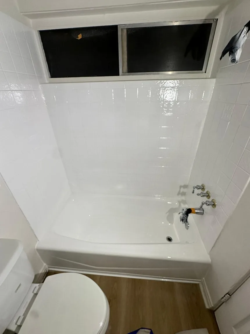 A refinished tub and shower wall.